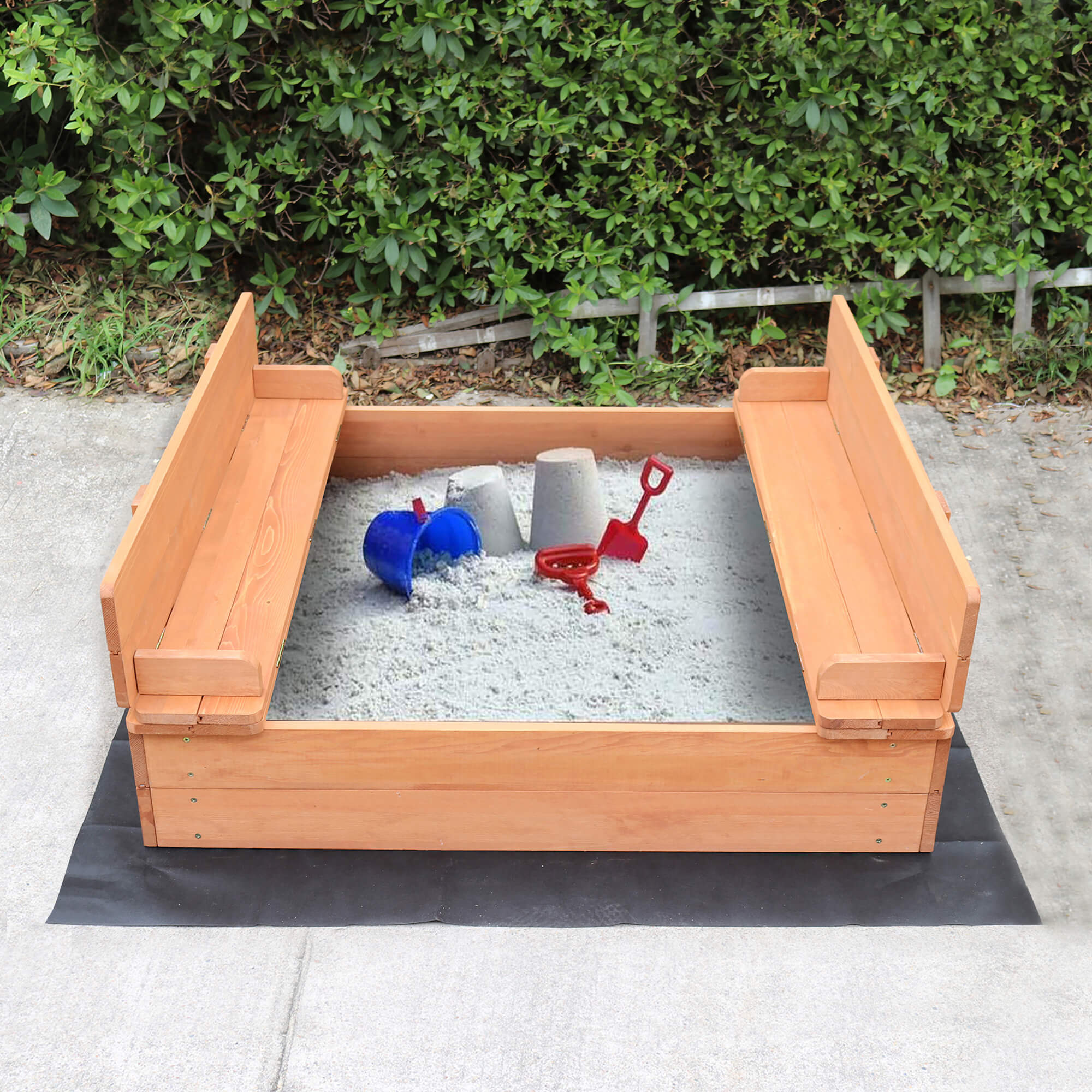 Children's sandpit with seating and cover